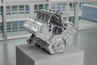 Ford Cosworth DFV, 2000  Chrome-plated bronze, concrete base engine: 50 x 65 x 60 cm base: 50 x 79 x 70 cm
